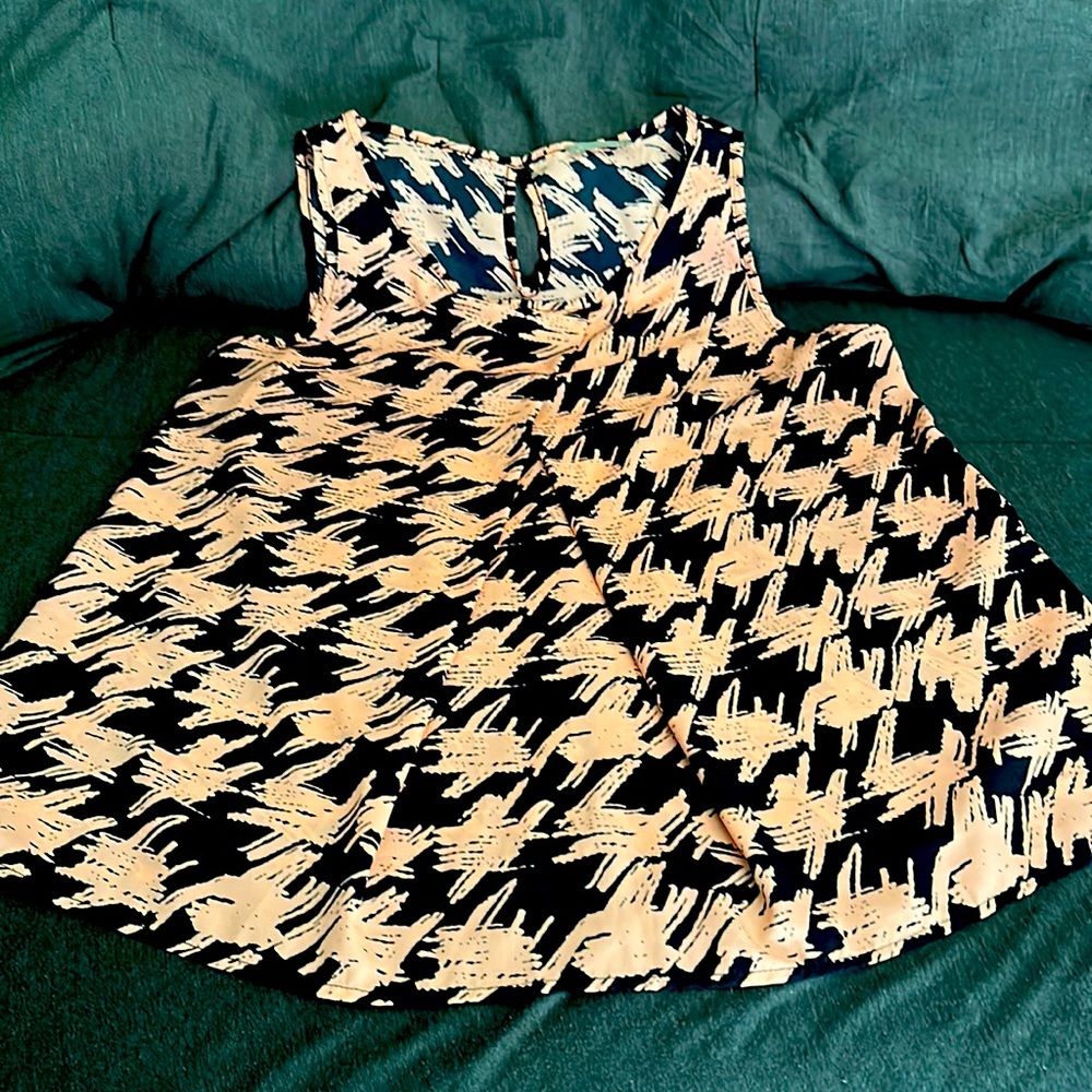 Women’s sleeveless blouse. For business attire.